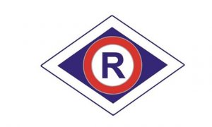 Znak w kształcie rombu z literą R w środku