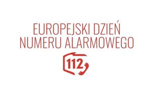 Biała tablica z czerwonymi napisami Europejski Dzień Numeru Alarmowego 112