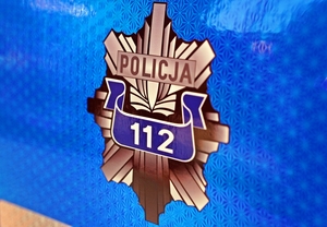 Gwiazda policyjna z numerem 112 w środku